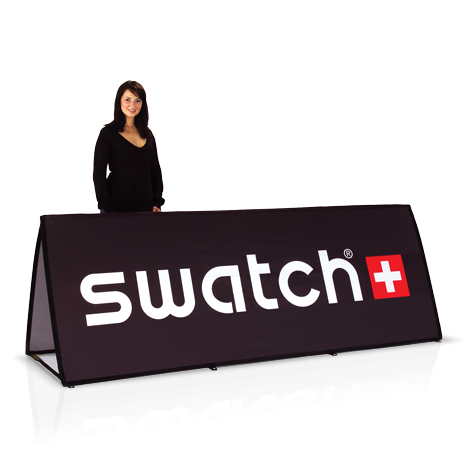 Female model wearing black, holding a large black branded rectangular pop-up banner advertising Swatch