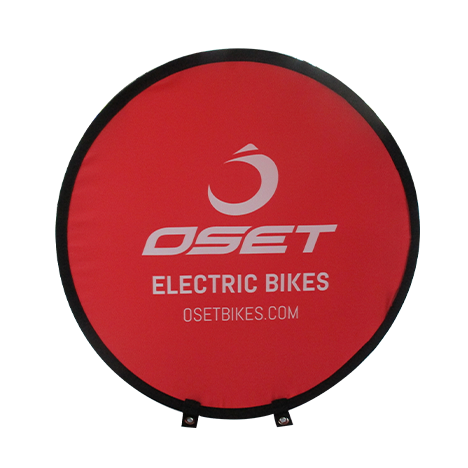 Red branded round pop-up banner for Oset Bikes