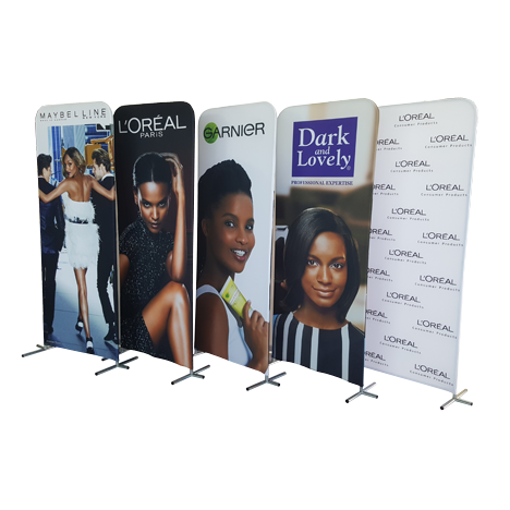 Branded pop-up stretch banners with a picture of a woman on the front advertising Maybelline
